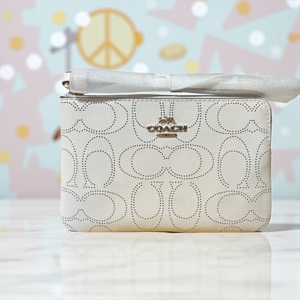 NWT Coach Perforated Signature Letter Zipper Wristlet